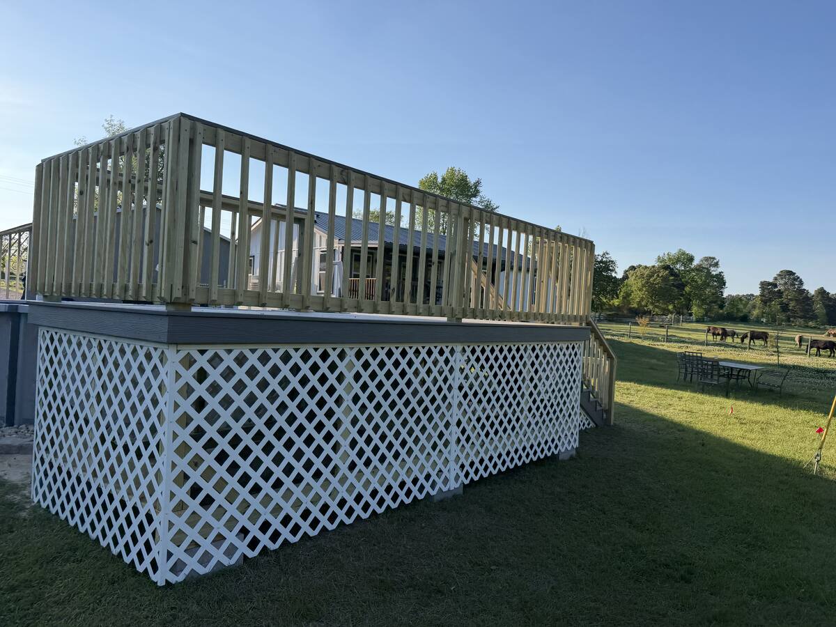 Above-ground pool deck with dual stair access